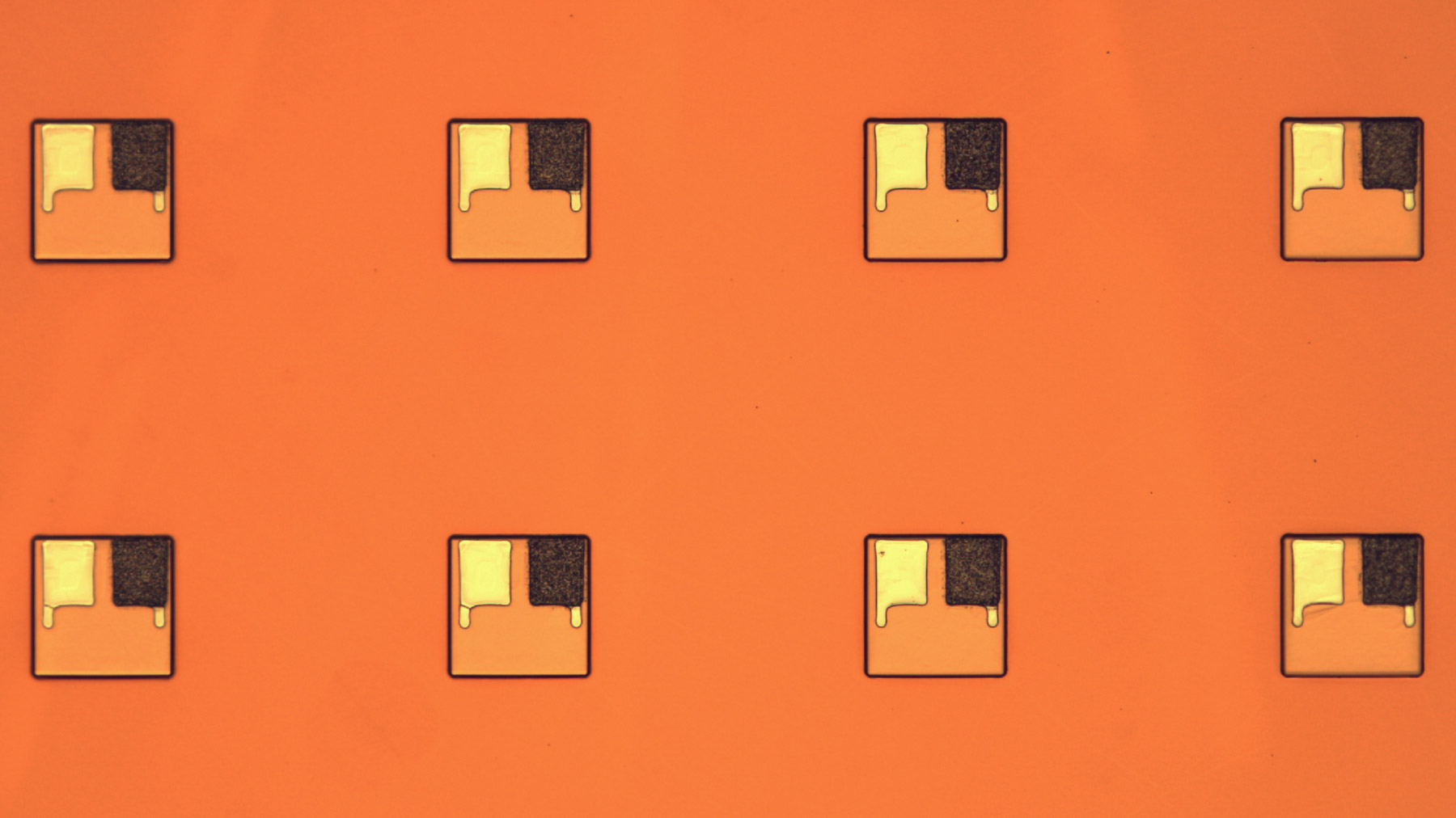 microbatteries on orange background